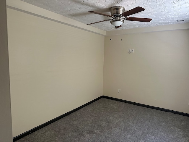 carpeted spare room with baseboards, a textured ceiling, and ceiling fan