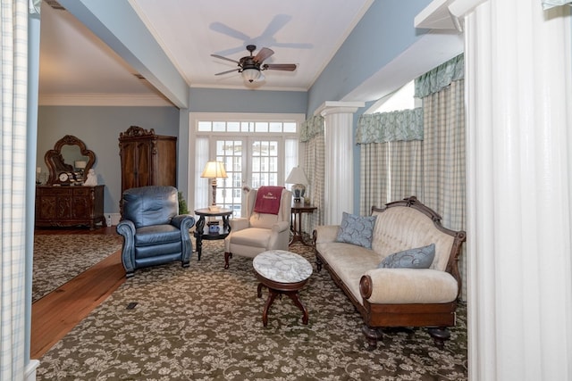 living area with wood-type flooring, french doors, ceiling fan, and ornamental molding