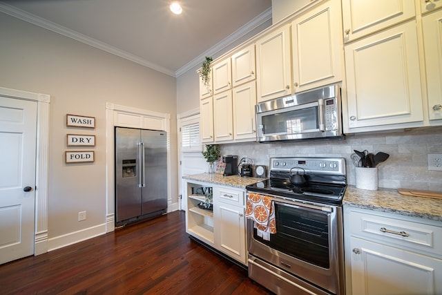 kitchen with appliances with stainless steel finishes, backsplash, light stone counters, ornamental molding, and dark wood-type flooring