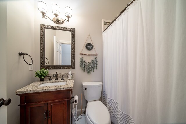 room details with ceiling fan, a fireplace, and wood-type flooring