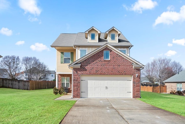 view of front of house with a garage and a front yard