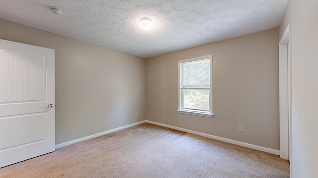650 Upland Ct, Columbus, GA 31907 - unfurnished room featuring a smoke detector, carpet floors, and a textured ceiling