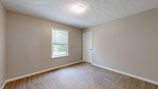 650 Upland Ct, Columbus, GA 31907 - unfurnished room featuring carpet flooring, baseboards, and a textured ceiling
