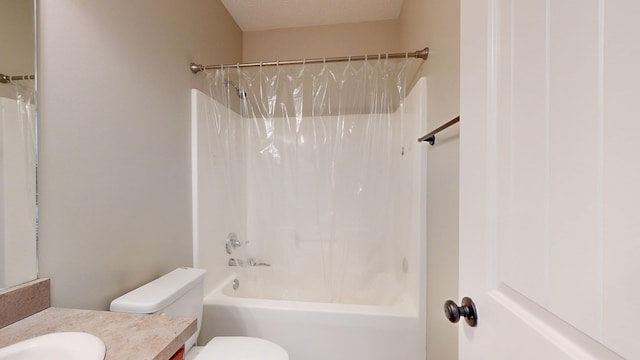 650 Upland Ct, Columbus, GA 31907 - bathroom featuring vanity, toilet, shower / tub combo with curtain, and a textured ceiling
