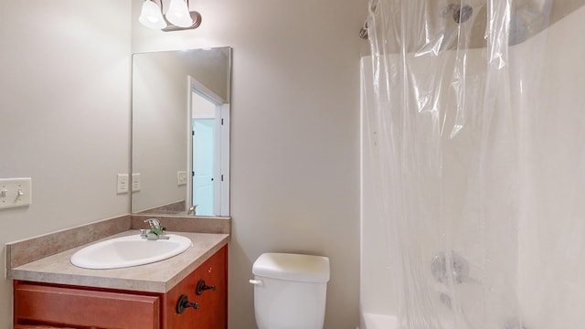 650 Upland Ct, Columbus, GA 31907 - bathroom with toilet, vanity, and shower / bath combo with shower curtain