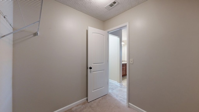 650 Upland Ct, Columbus, GA 31907 - hallway featuring baseboards and light carpet