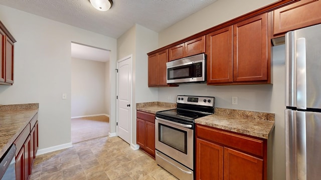 650 Upland Ct, Columbus, GA 31907 - kitchen with appliances with stainless steel finishes and light countertops