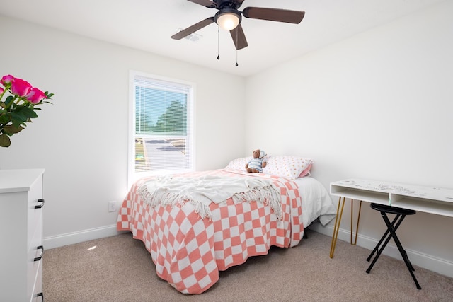 bedroom with visible vents, carpet flooring, baseboards, and ceiling fan