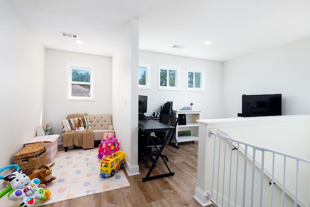 office area featuring wood finished floors, visible vents, and recessed lighting