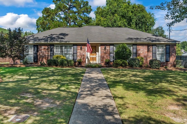 3406 Seminole Dr, Columbus, GA 31907 - single story home with a front yard, brick siding, and roof with shingles