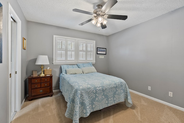 3406 Seminole Dr, Columbus, GA 31907 - bedroom featuring carpet floors, a textured ceiling, and a ceiling fan