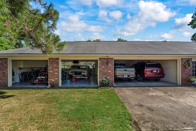 3406 Seminole Dr, Columbus, GA 31907 - view of property exterior featuring brick siding, a garage, a yard, and roof with shingles