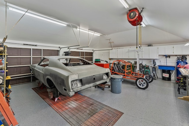 3406 Seminole Dr, Columbus, GA 31907 - garage featuring a garage door opener