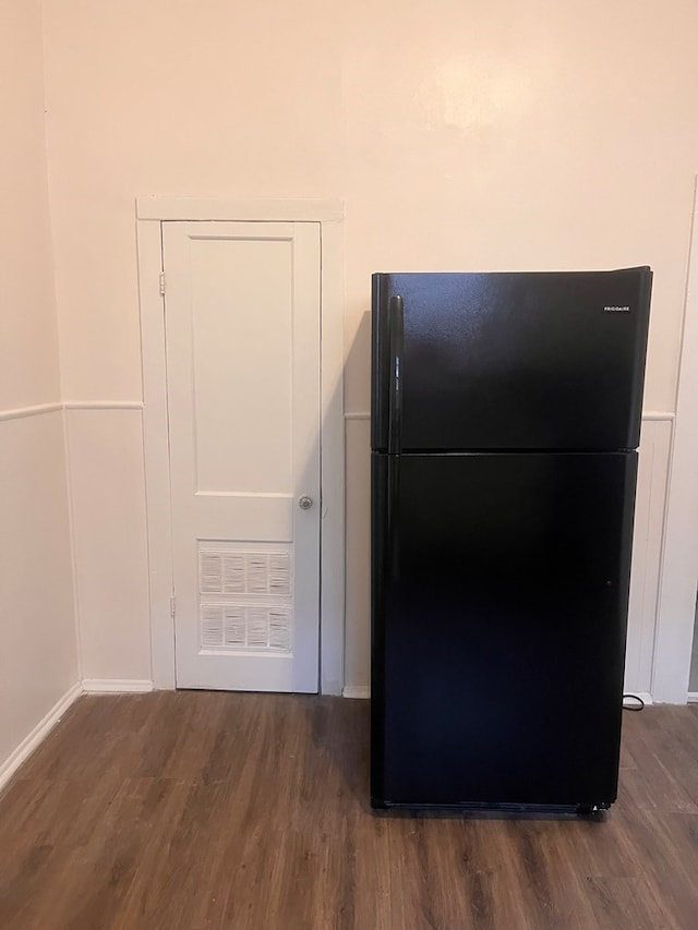 1348 Rhodes St, Columbus, MS 31901 - detailed view of freestanding refrigerator and wood finished floors