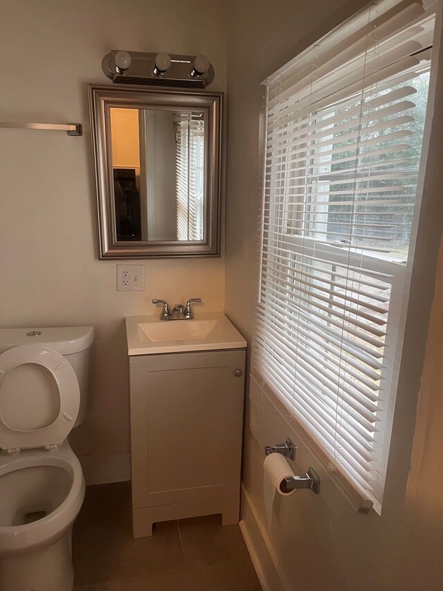 1348 Rhodes St, Columbus, MS 31901 - half bath with vanity and tile patterned flooring