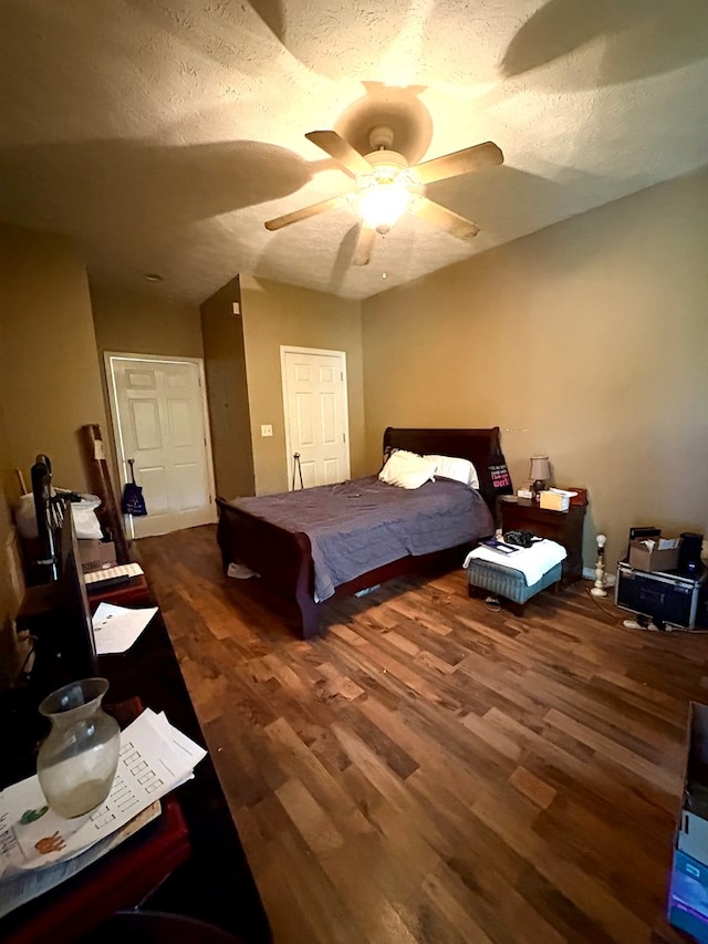 102 Parker St, Lagrange, GA 30240 - bedroom with wood finished floors, a ceiling fan, and a textured ceiling