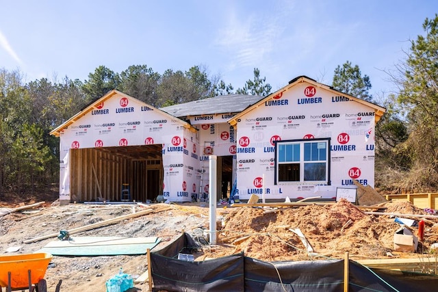 property under construction featuring an attached garage