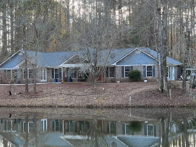 view of front facade featuring a water view