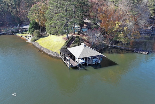 drone / aerial view featuring a water view