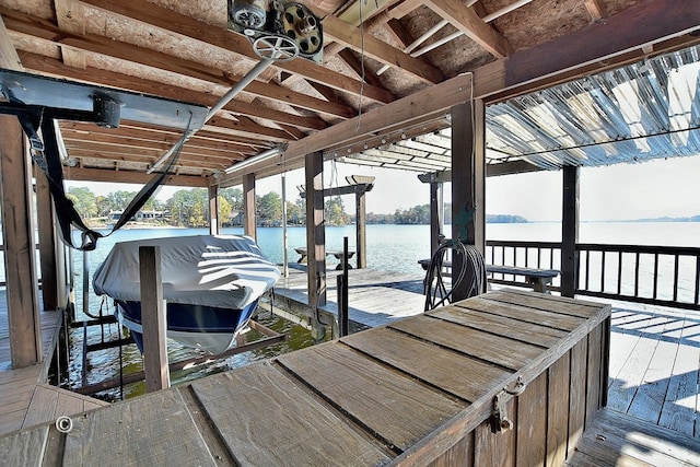 dock area with a water view