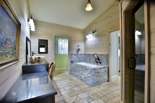 bathroom with vanity, wooden walls, independent shower and bath, and lofted ceiling