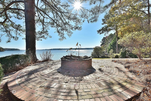 view of patio / terrace with a water view