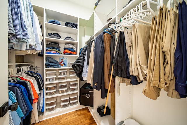 spacious closet with wood finished floors