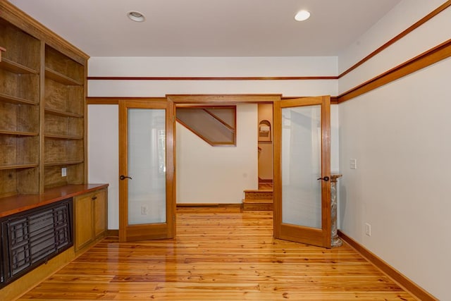 9250-11 River Rd, Fortson, GA 31808 - unfurnished room featuring french doors, recessed lighting, light wood finished floors, and stairs