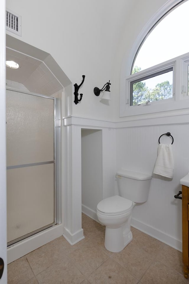 9250-11 River Rd, Fortson, GA 31808 - full bathroom featuring vanity, a stall shower, tile patterned floors, and wainscoting