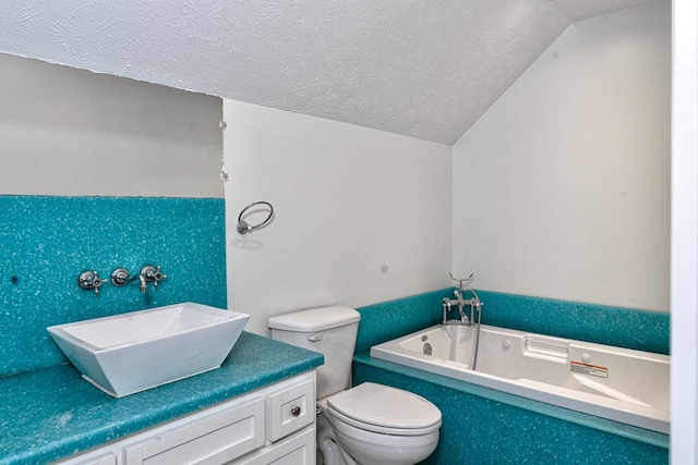 9250-11 River Rd, Fortson, GA 31808 - full bathroom featuring a bath, a textured ceiling, lofted ceiling, and vanity