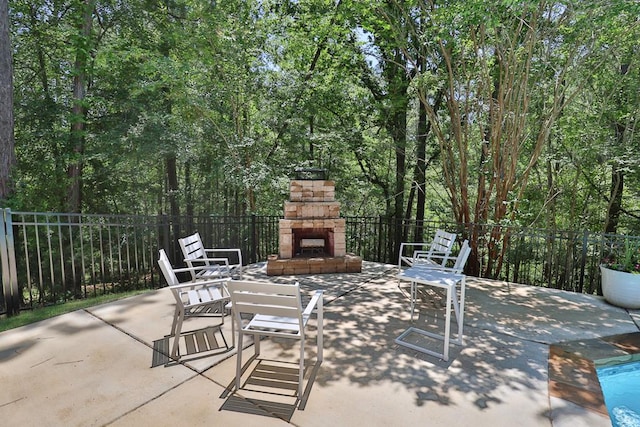 9250-11 River Rd, Fortson, GA 31808 - view of patio with an outdoor stone fireplace