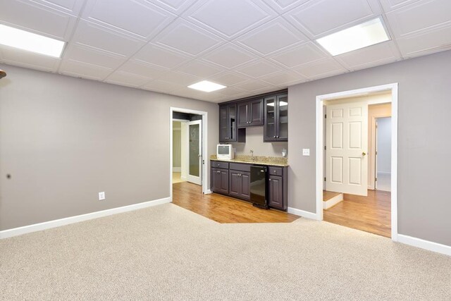 9250-11 River Rd, Fortson, GA 31808 - kitchen with light colored carpet, glass insert cabinets, light countertops, and dark brown cabinetry