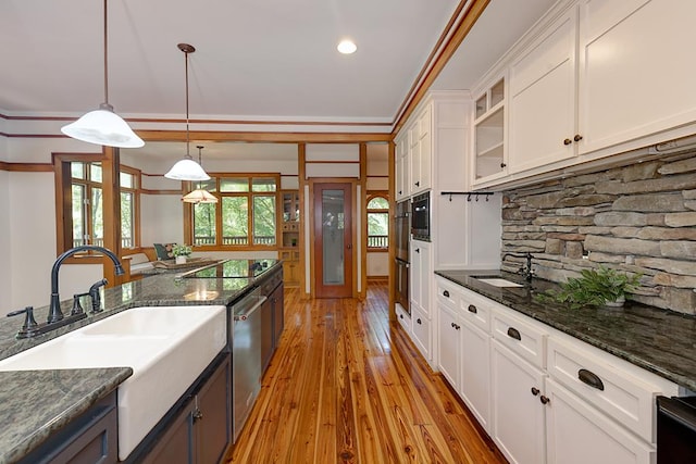 9250-11 River Rd, Fortson, GA 31808 - kitchen featuring stainless steel appliances, white cabinetry, pendant lighting, glass insert cabinets, and dark stone counters