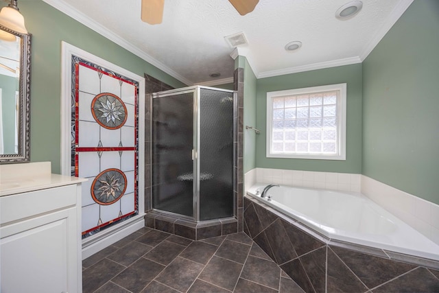 7015 Widgeon Dr, Midland, GA 31820 - bathroom featuring vanity, a garden tub, a shower stall, ceiling fan, and tile patterned floors