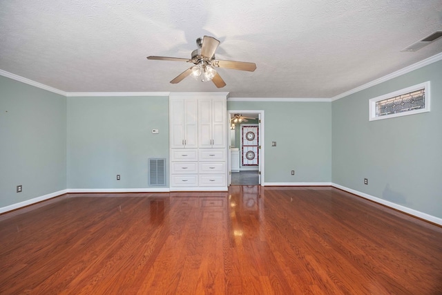 unfurnished bedroom featuring visible vents, crown molding, baseboards, and wood finished floors