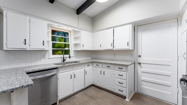 kitchen with dishwasher, light hardwood / wood-style floors, white cabinetry, and sink