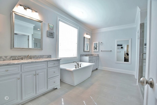 full bathroom featuring two vanities, a sink, ornamental molding, a soaking tub, and a shower stall