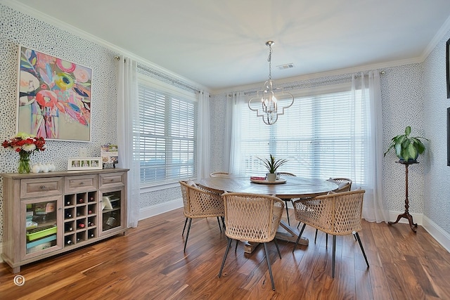 dining area with wallpapered walls, visible vents, dark wood-style floors, and crown molding