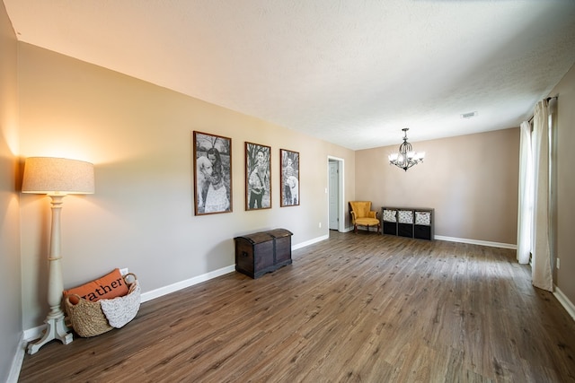 6801 Buckeye Way, Columbus, GA 31904 - living area with wood finished floors and a chandelier