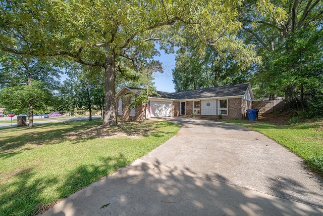 6801 Buckeye Way, Columbus, GA 31904 - ranch-style house with driveway, an attached garage, and brick siding