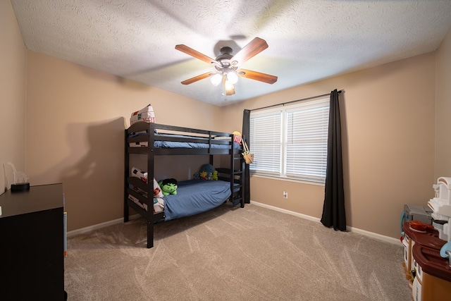 6801 Buckeye Way, Columbus, GA 31904 - bedroom featuring carpet, a textured ceiling, and a ceiling fan
