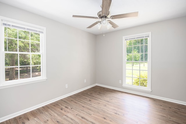 8085 Ga Highway 0219, Hamilton, GA 31811 - empty room featuring wood finished floors, baseboards, and ceiling fan