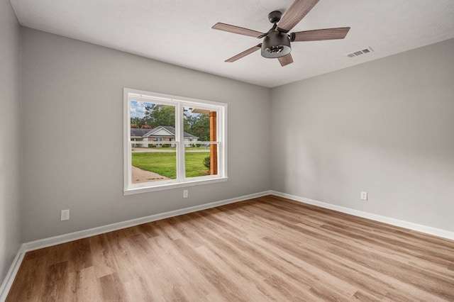 2906 Kent Dr, Phenix City, AL 36870 - empty room featuring light wood-type flooring and a ceiling fan