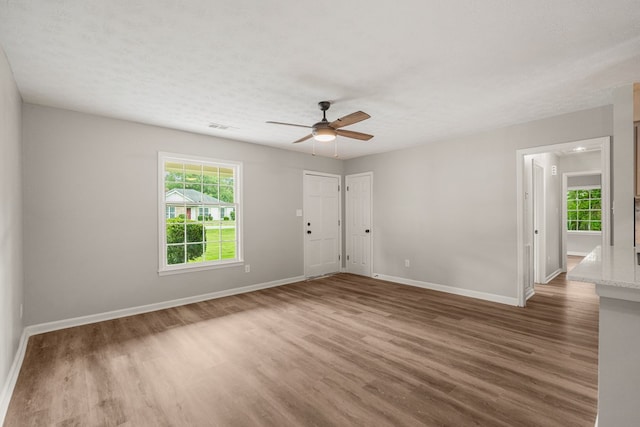 2906 Kent Dr, Phenix City, AL 36870 - empty room featuring a ceiling fan and wood finished floors