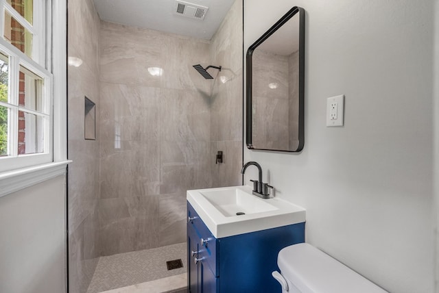 2906 Kent Dr, Phenix City, AL 36870 - bathroom with tiled shower and vanity