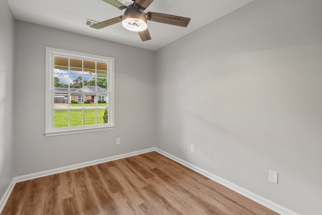 2906 Kent Dr, Phenix City, AL 36870 - spare room with wood finished floors and ceiling fan