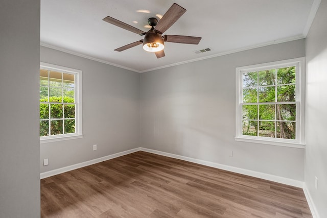 2906 Kent Dr, Phenix City, AL 36870 - unfurnished room with crown molding, wood finished floors, and a ceiling fan