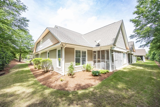 1438 Grove Park Dr Unit 8B, Columbus, GA 31904 - view of home's exterior with roof with shingles, a sunroom, and a yard