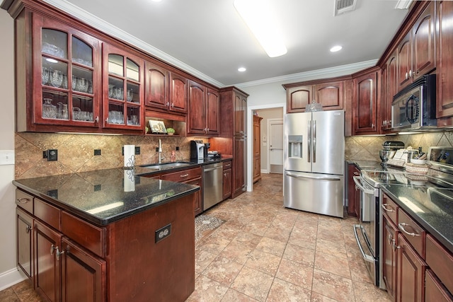 1438 Grove Park Dr Unit 8B, Columbus, GA 31904 - kitchen with stainless steel appliances, a sink, crown molding, decorative backsplash, and glass insert cabinets