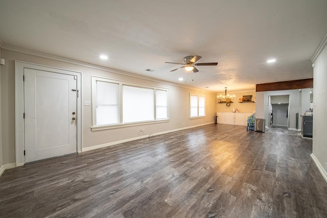 unfurnished living room featuring ceiling fan with notable chandelier, ornamental molding, and dark wood-type flooring